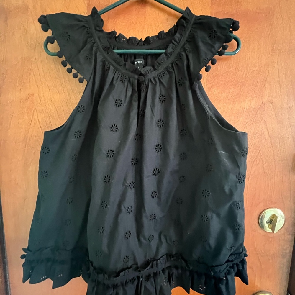 Beautiful J crew black eyelet top. Pom Pom sleeve trim. Super cute!